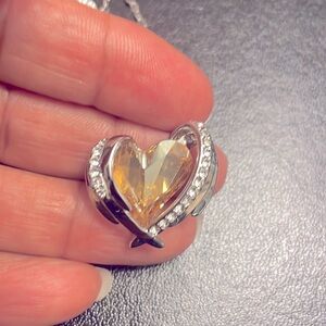 2 items: Elegant Silver Heart Necklace and Gold Heart Pendant